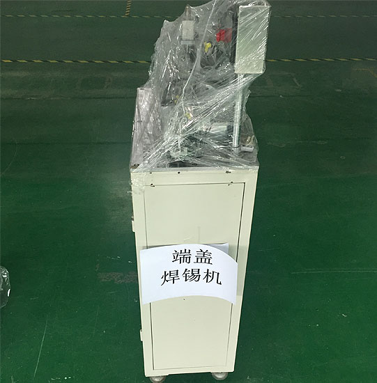 End cap solder machine